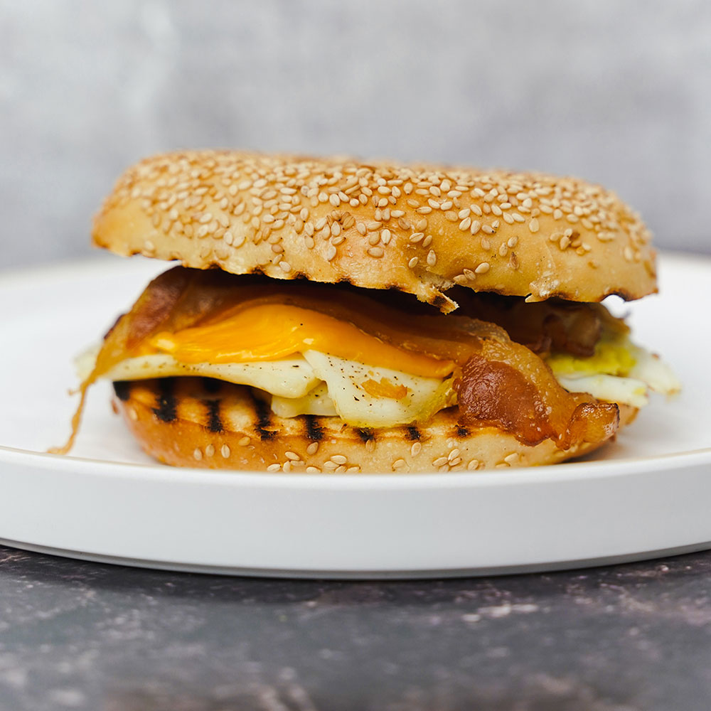 Bagel Sandwich with eggs, cheese, and bacon served for breakfast near Dutch Kills, Queens, New York.