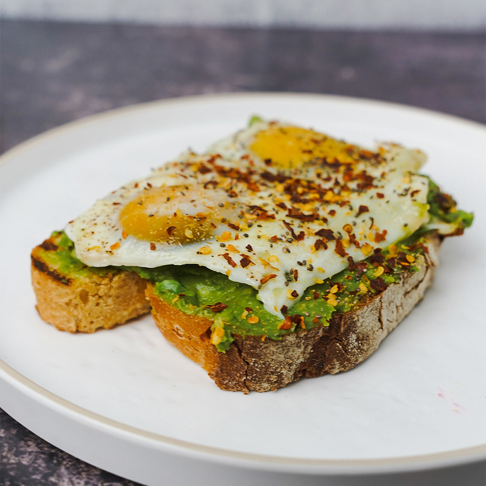 Delicious Astoria, Queens avocado toast served for breakfast or brunch at Royal Delight Cafe.