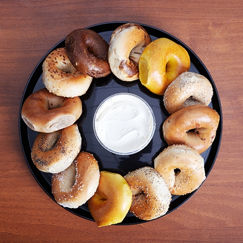 Upper East Side, Manhattan corporate & party caterers serving platter of bagels and cream cheese.